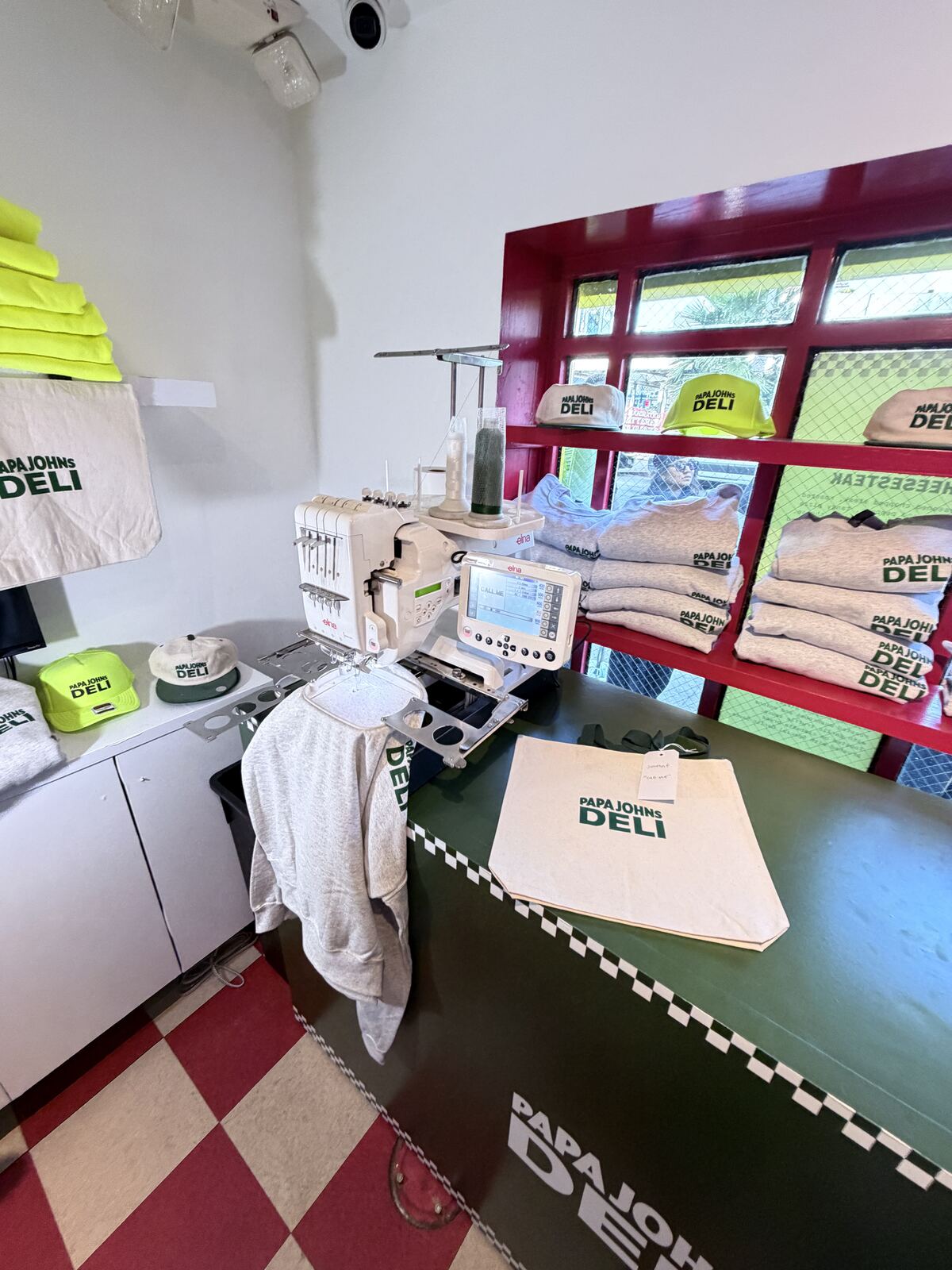 DTF and heat transfer decoration equipment with fluorescent apparel samples on display